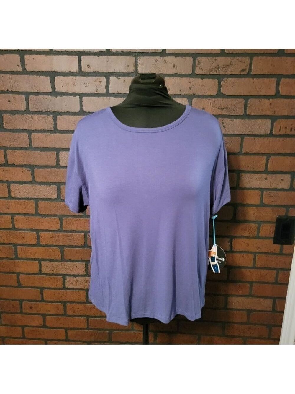 NWT Half Moon by Modern Movement Purple top with twisted knot back detail.